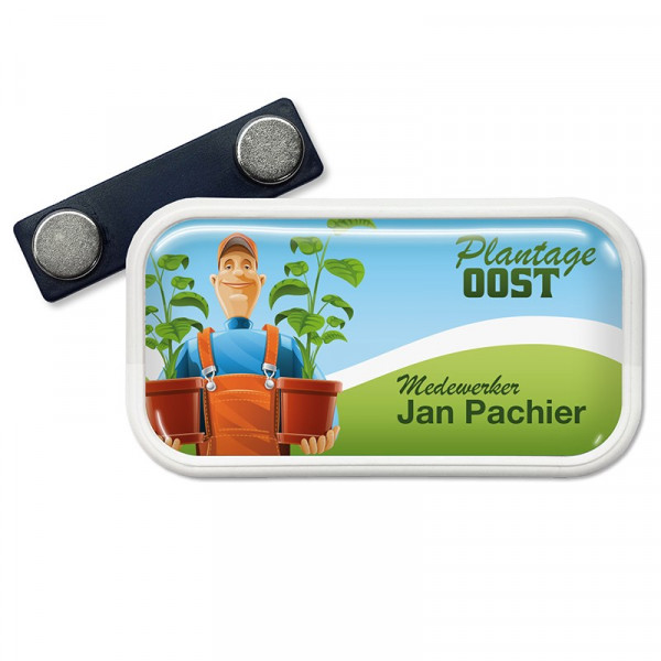 Rechthoekige naambadge van kunststof met dominglabel en magneetsluiting. 70 x 35 mm